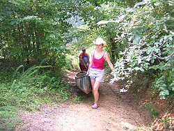 Carring the canoe out of the ditch