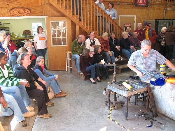 Judson College class watching Cal Breed shape a vase