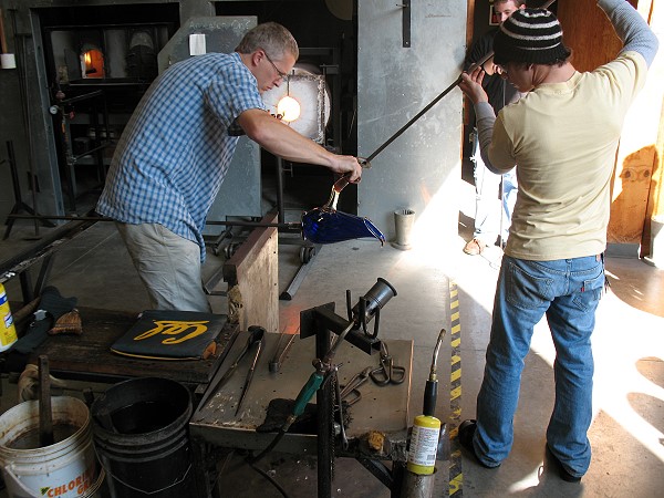 Cal Breed and assistant attach handle to vase