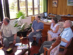 Thomas Wilson discusses Judson College students visiting CATIE with Director Gerneral  Dr. Pedro Ferreira.