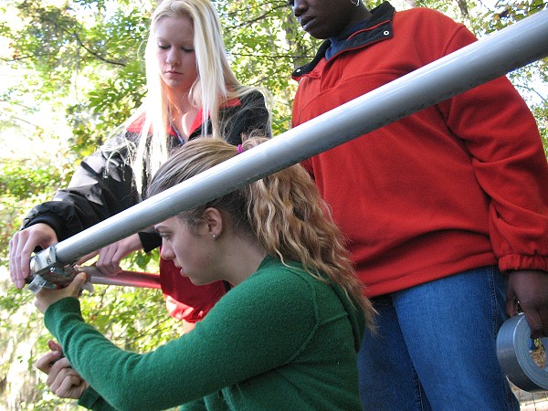 Caroline Price repairing ramp railing