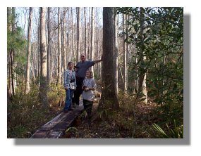 Dr. Wilson, Amber Bailey & Kelly Shipman at water tupelo ecosystem in Audubon Bird Sanctuary