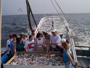 Dr. Wilson identifying the catch