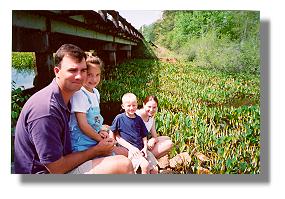 Chad, Lauren, Hudson, and Caroline Wilson visit the golden club area