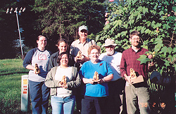 Class members were present an olivewood carving by the James Family.